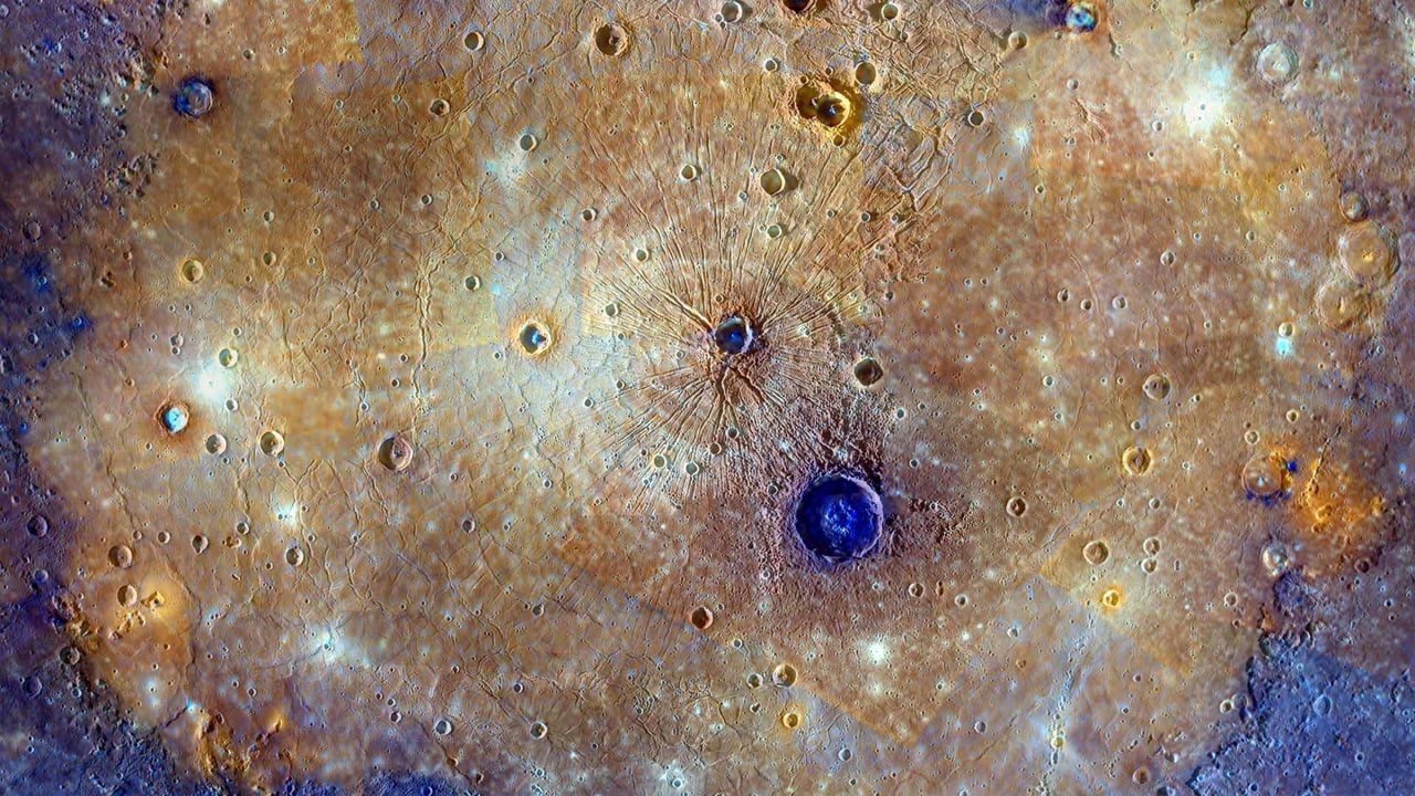 Enhanced-color composite of the Caloris Basin, Mercury (© NASA/Johns Hopkins University Applied Physics Laboratory/Carnegie Institution of Washington)