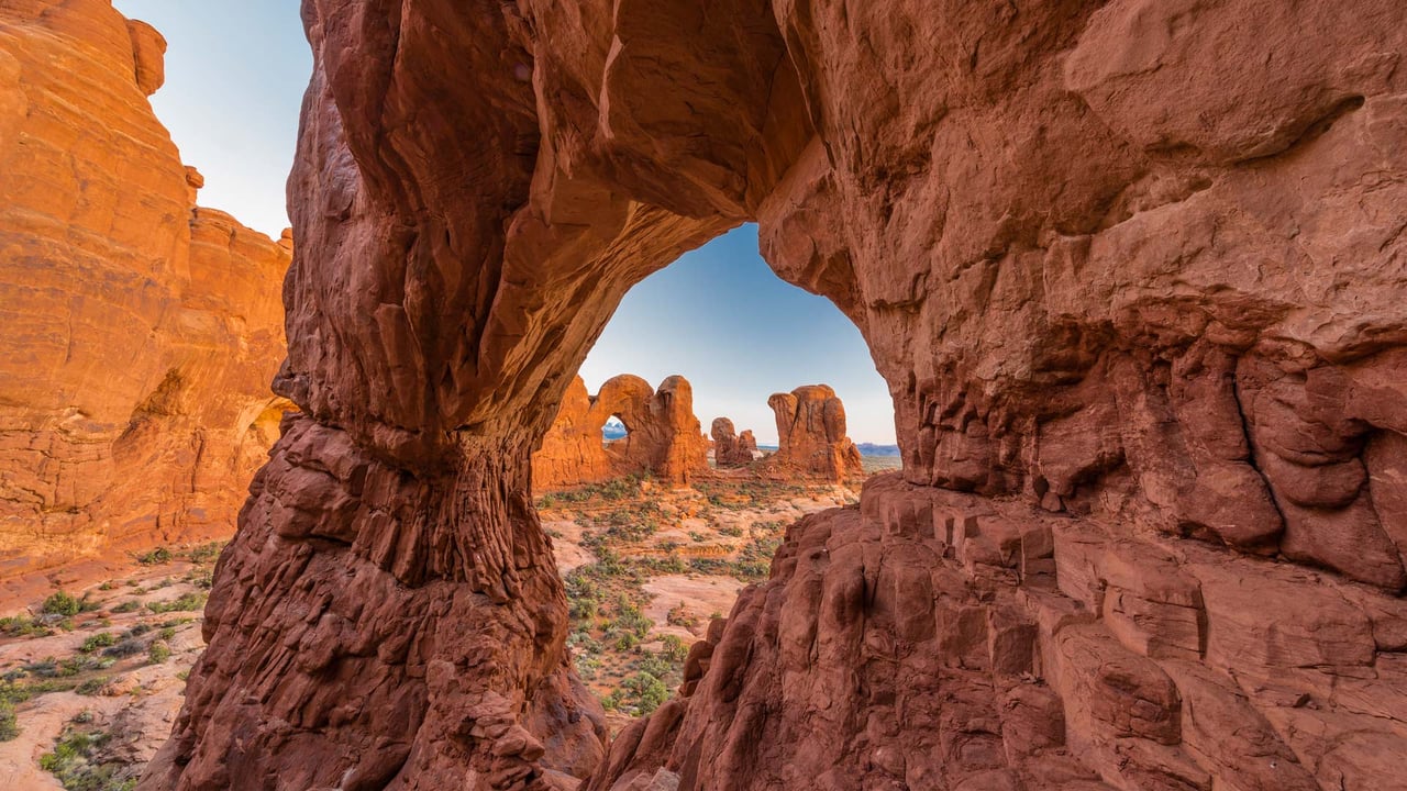 Double Arch seen through Cove Arch, Arches National Park, Utah (© Jeff Foott/Minden Pictures)