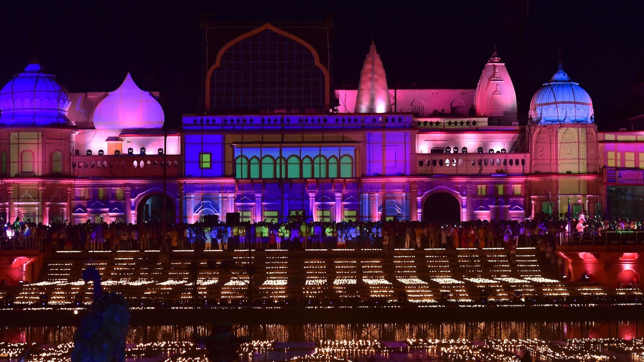 Lamps on the banks of the Sarayu River for Diwali, Ayodhya, India (© SANJAY KANOJIA/AFP/Getty Images)