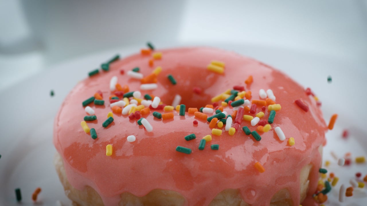 A glazed doughnut with sprinkles (© viafilms/Getty Images)