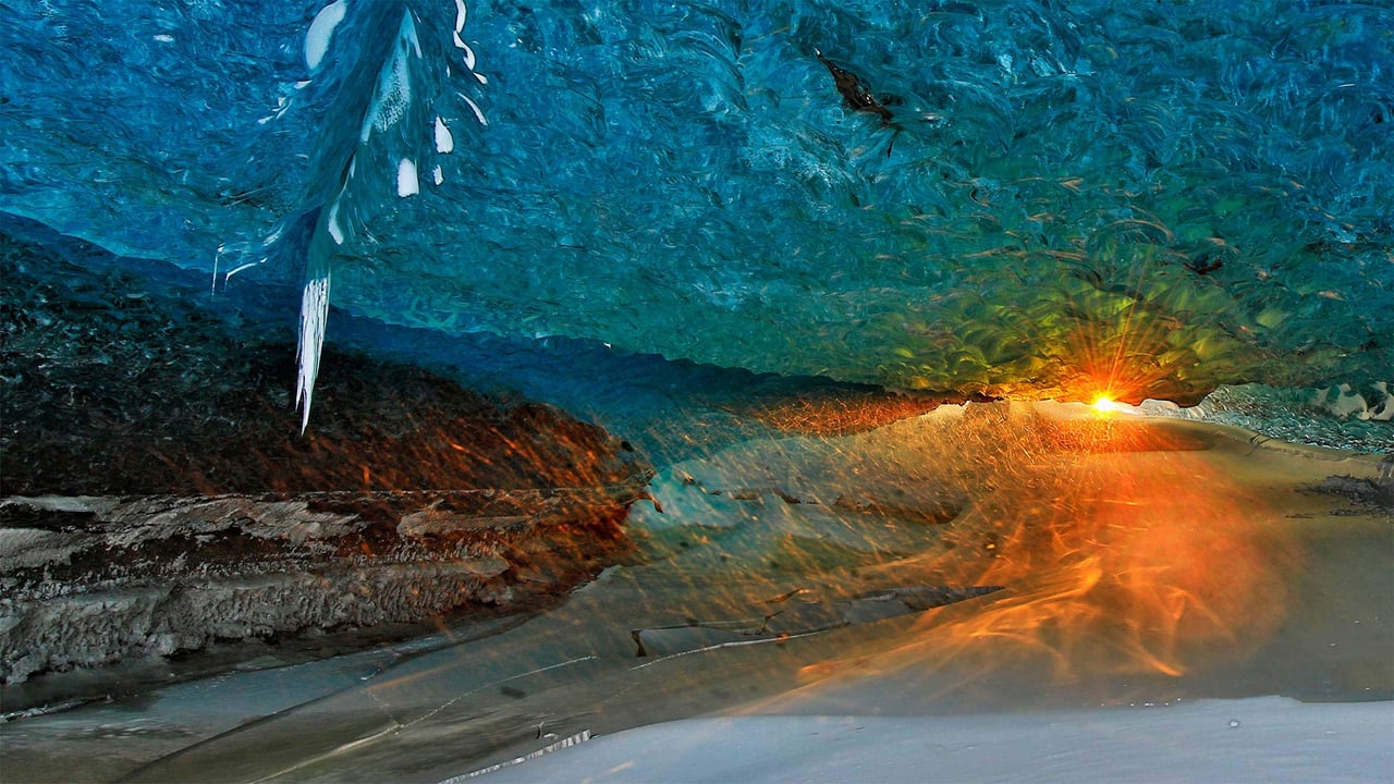 Ice cave at sunset in Vatnajokull, Iceland (© Johnathan Ampersand Esper/Aurora Photos)