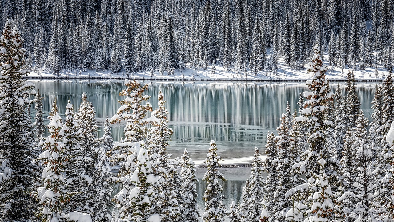 A frozen lake in Banff National Park (© RuslanKaln/Getty Images)