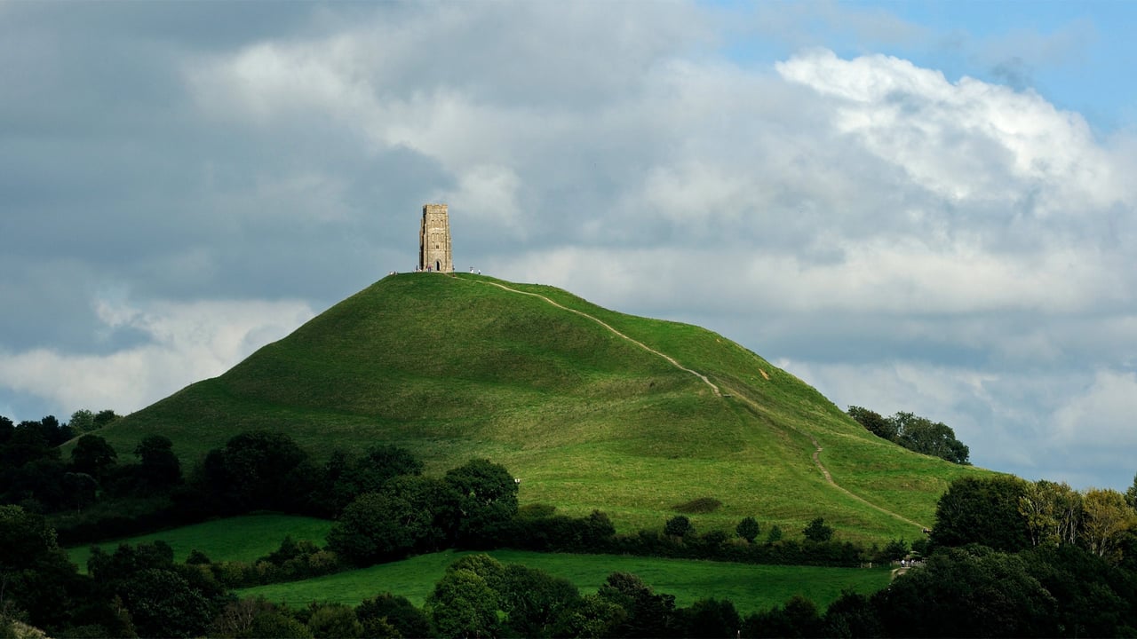 Glastonbury Tor and St. Michael's Tower in England for the start of the Glastonbury Festival (© Spraggon Photography/Getty Images Plus)