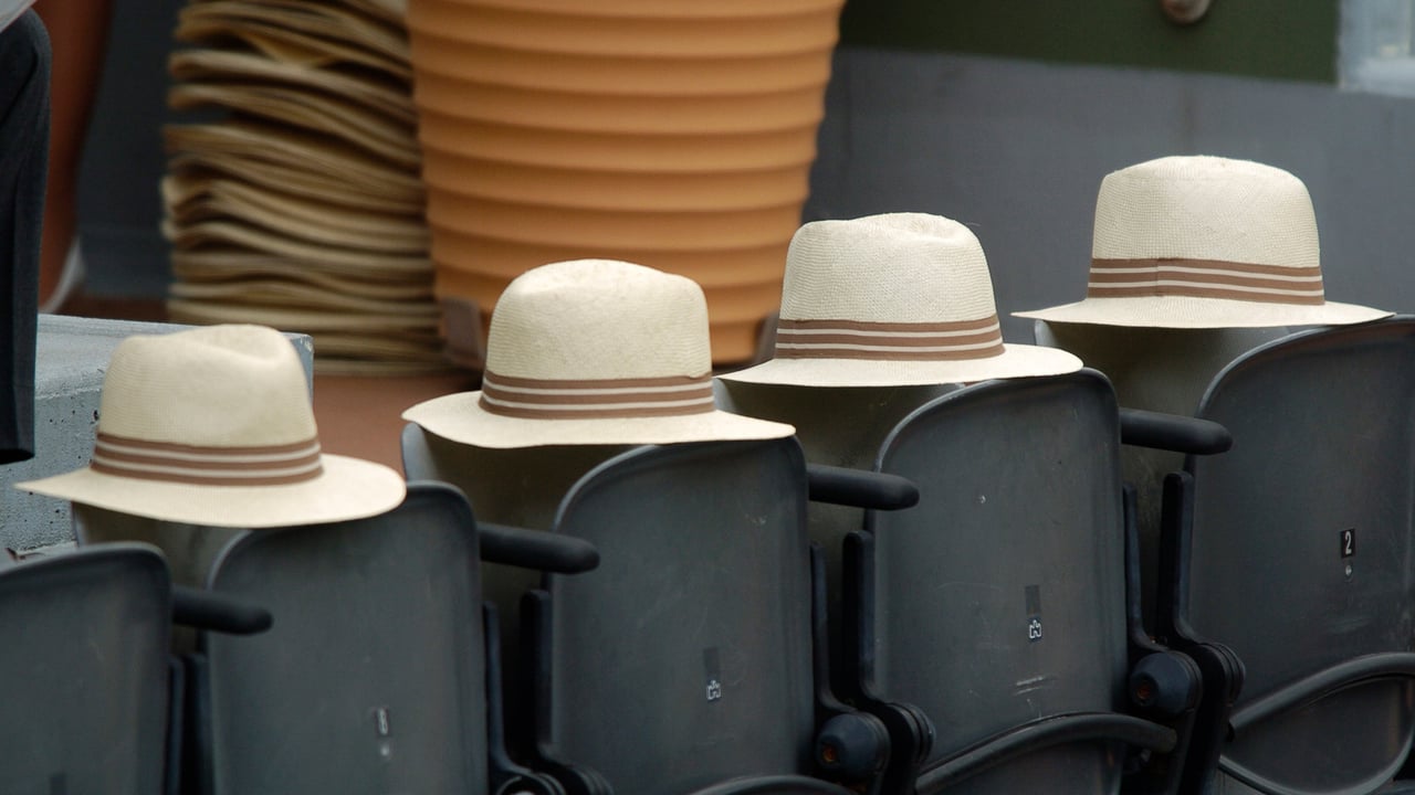 Chapeaux de paille dans les tribunes de Roland-Garros, Paris (© Horacio Villalobos/Corbis)