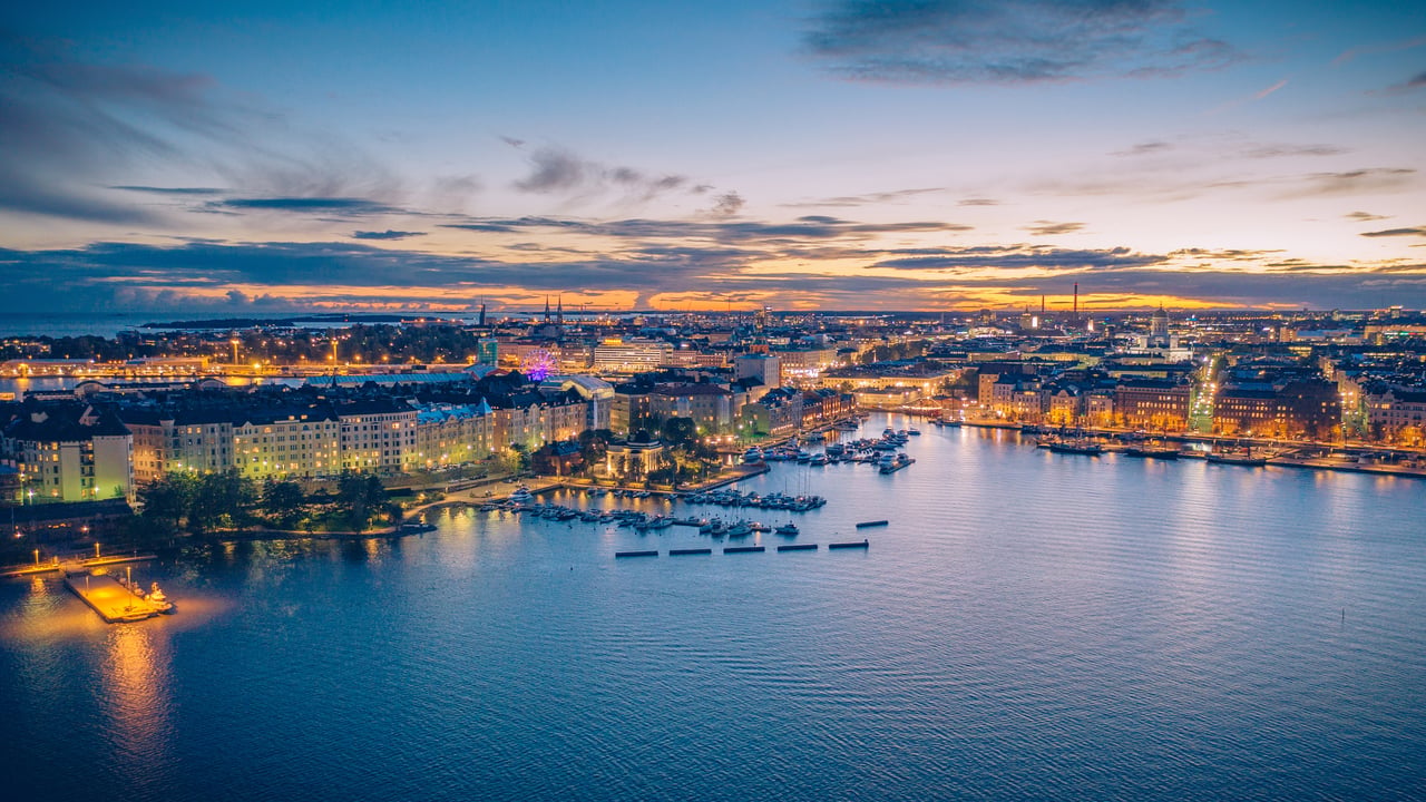 Helsinki's shoreline during blue hour, Uusimaa, Finland (© Miemo Penttinen/Getty Images)