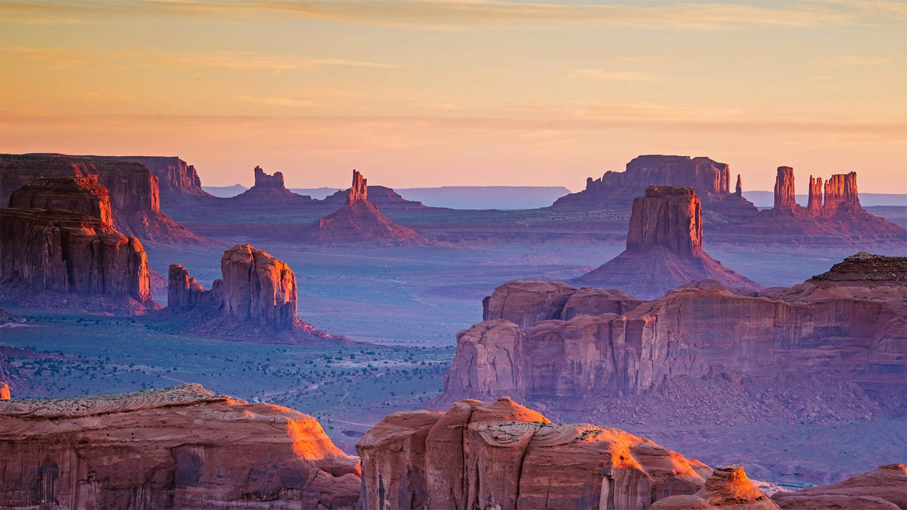 A view of Monument Valley Navajo Tribal Park from Hunts Mesa, Navajo Nation, between Arizona and Utah (© AWL Images/Danita Delimont)