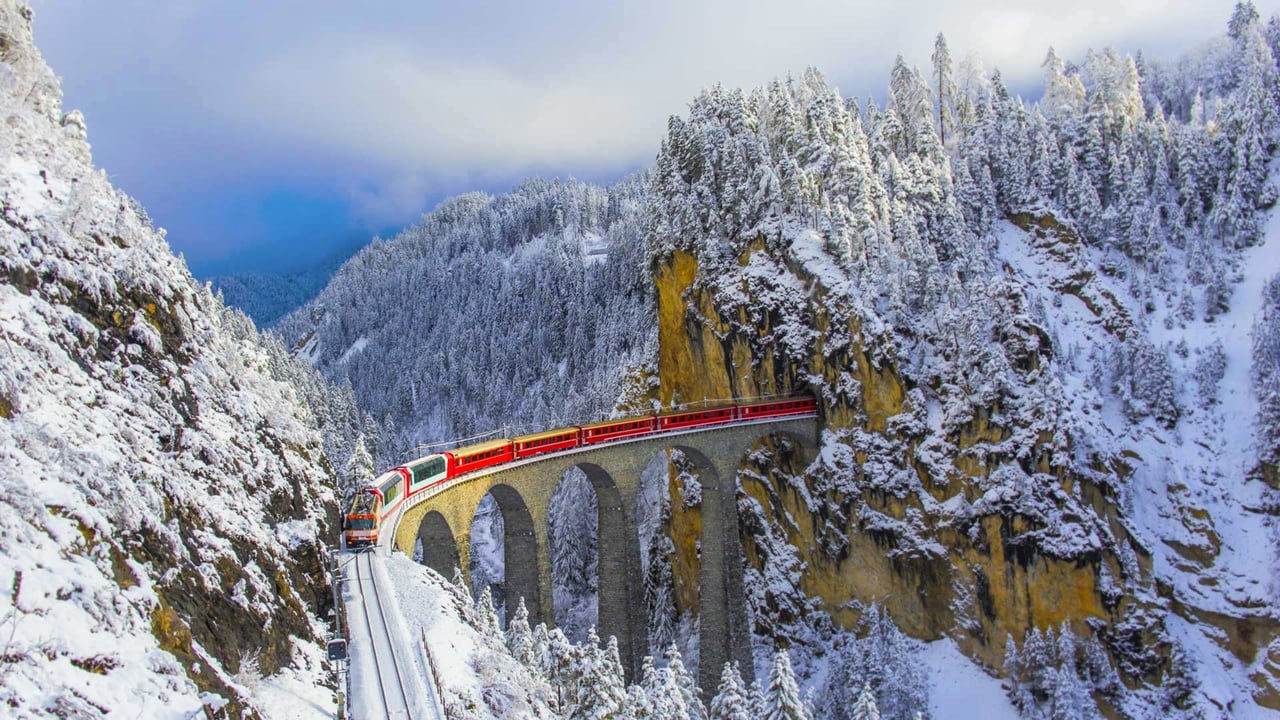 Bernina Express on the Landwasser Viaduct, Graubünden, Switzerland (© Marco Bottigelli/Getty Images)