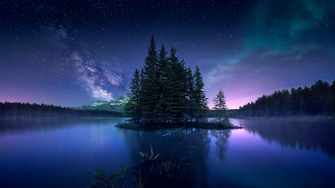Aurora Borealis at Two Jack Lake, Alberta, Canada (© Jesús M. García/Getty Images)