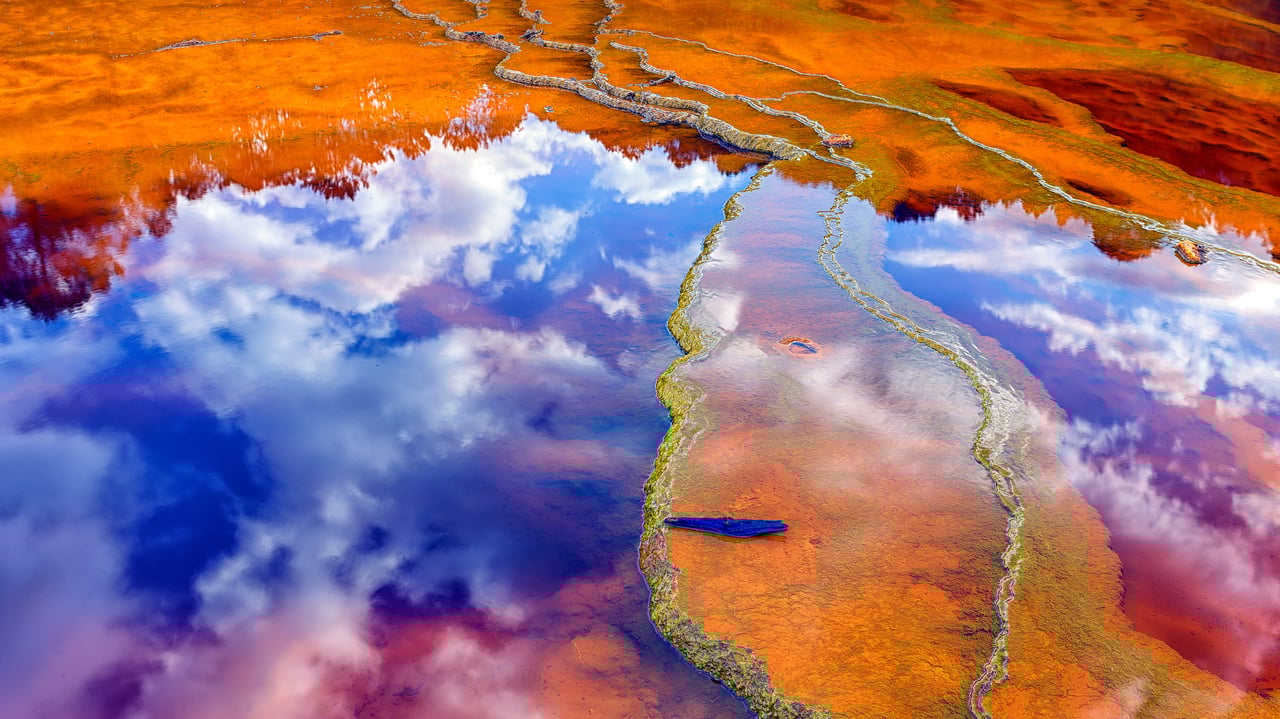 Mineral-laden water in the Rio Tinto, Minas de Riotinto mining area, Huelva province, Andalusia, Spain (© David Santiago Garcia/Getty Images)
