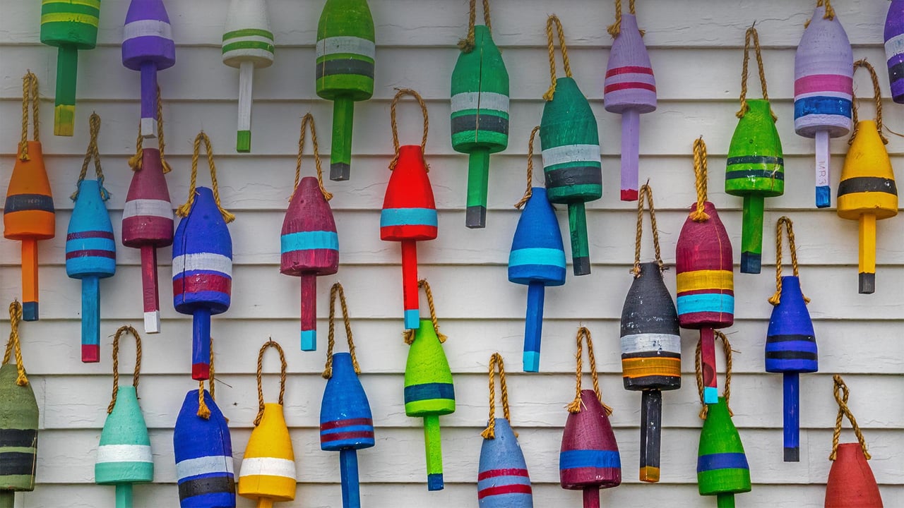 Multicolored lobster buoys, Acadia National Park, Maine (© Cheri Alguire/Shutterstock)