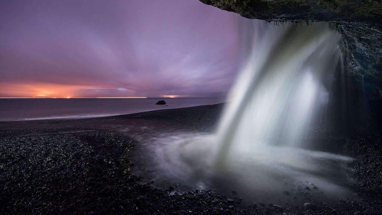 View of a waterfall at Mystic Beach in Juan de Fuca Provincial Park, B.C. during dusk (© DEEPOL/Plainpicture)