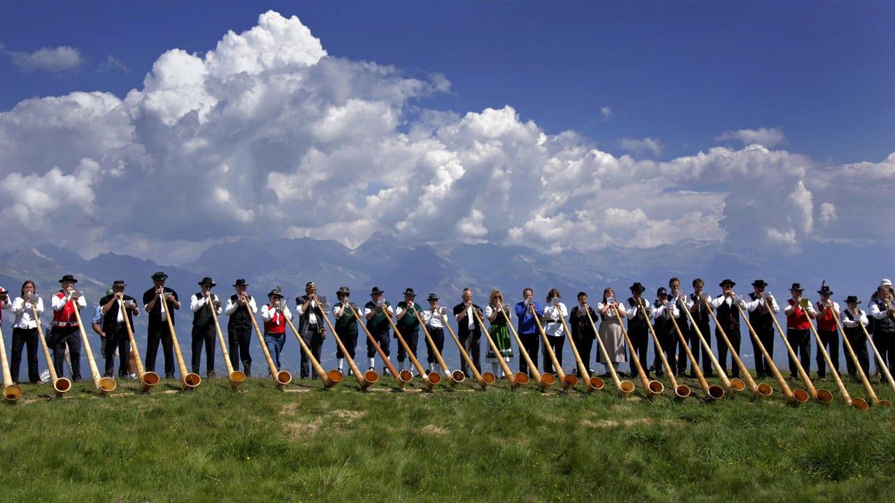 Alphorn musicians perform during the International Alphorn Festival in Nendaz, Switzerland (© Fabrice Coffrini/Getty Images)