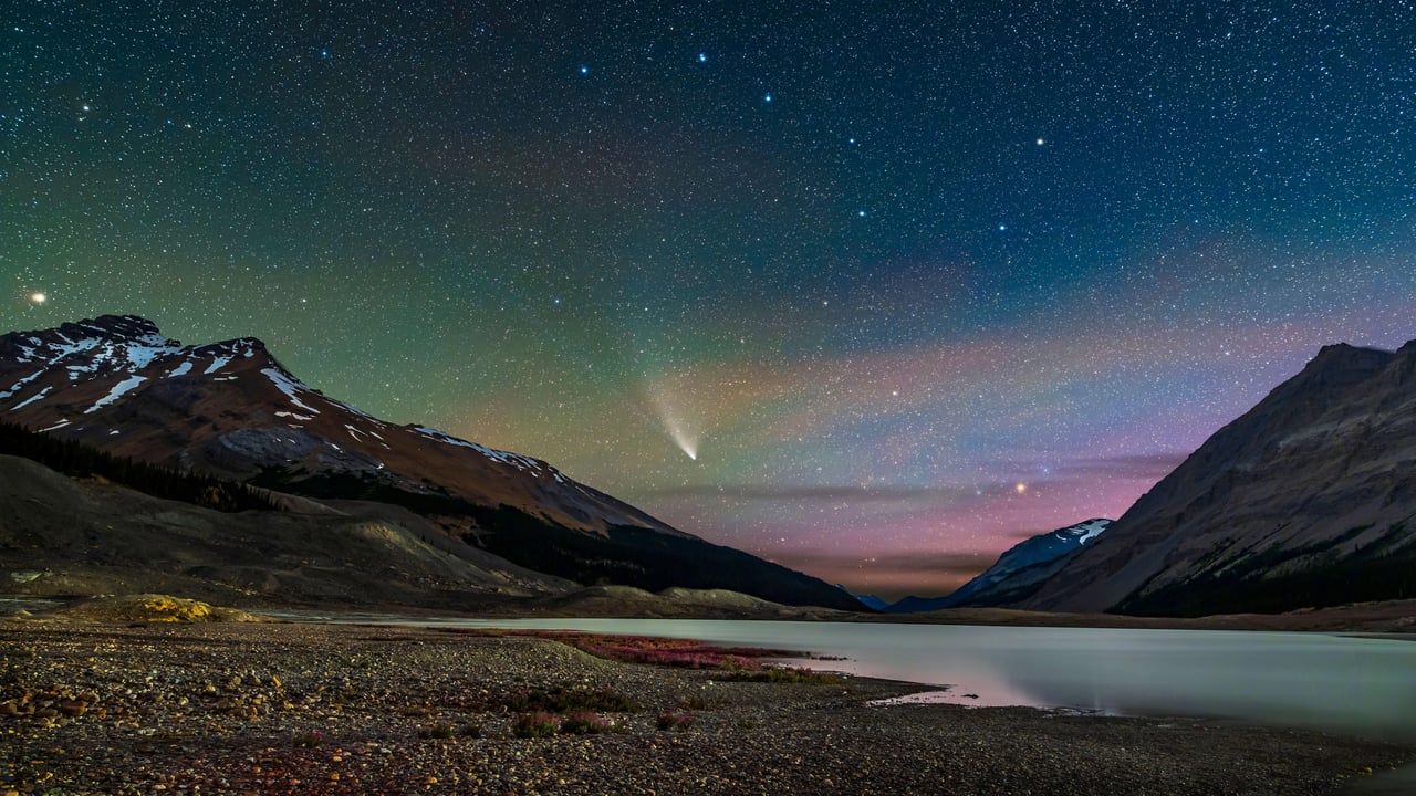 Comet NEOWISE streaks across the sky over Sunwapta Lake in Jasper National Park, Alberta, Canada (© Stocktrek Images, Inc./Alamy)