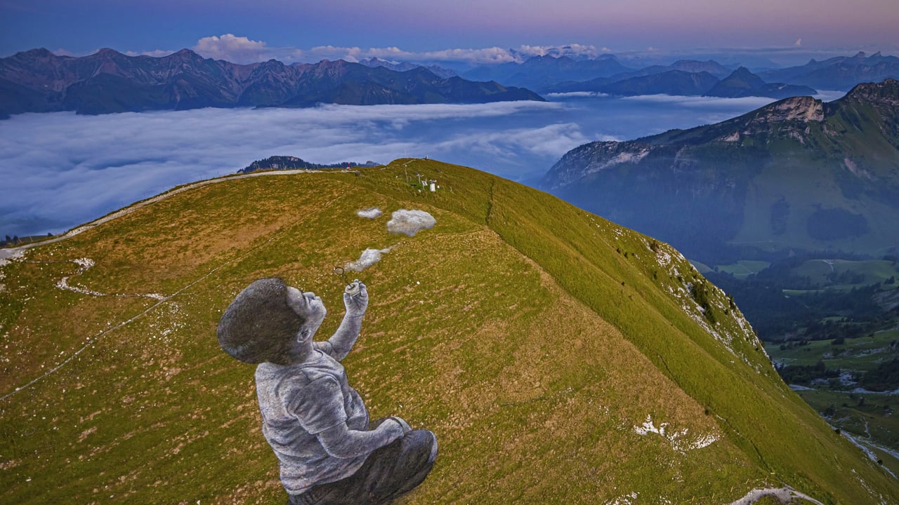 'A New Breath' by artist Saype in Moléson-sur-Gruyères, Switzerland (© Valentin Flauraud/Shutterstock)