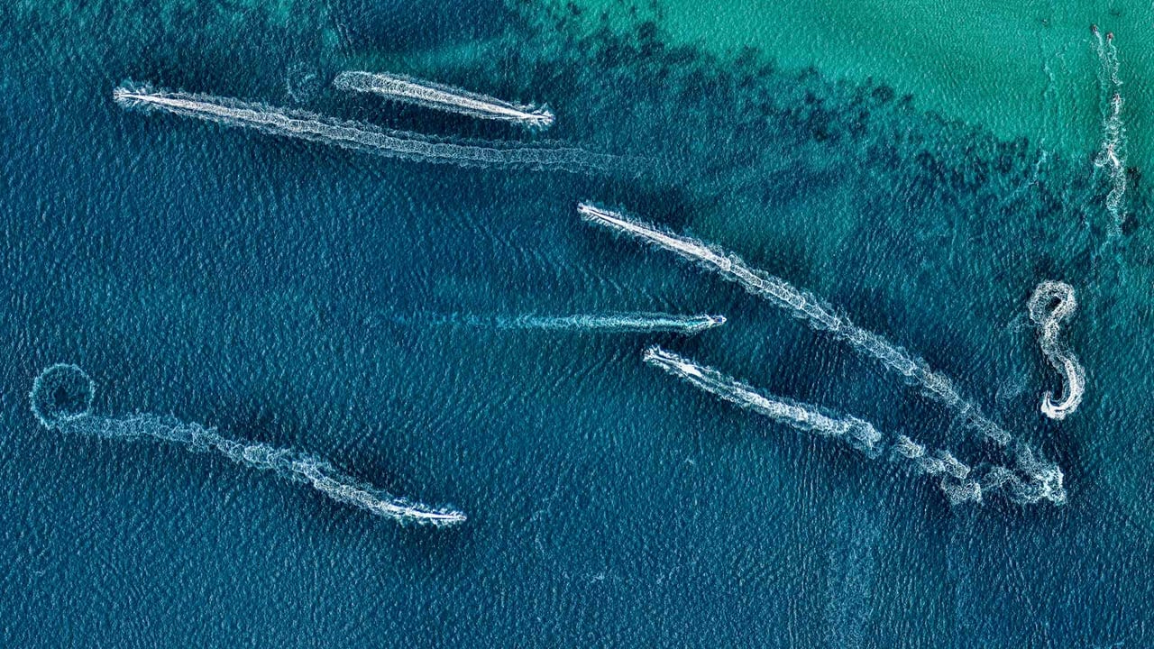 Aerial view of jet skis in the ocean, Australia (© Nearmap/Getty Images)