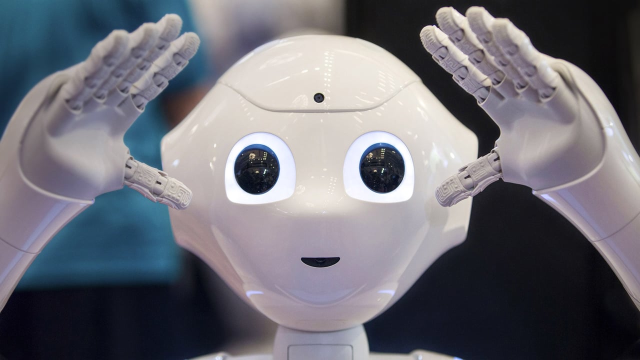 Pepper, SoftBank Robotics' humanoid robot, on display in Tokyo (© Christopher Jue/EPA/Shutterstock)