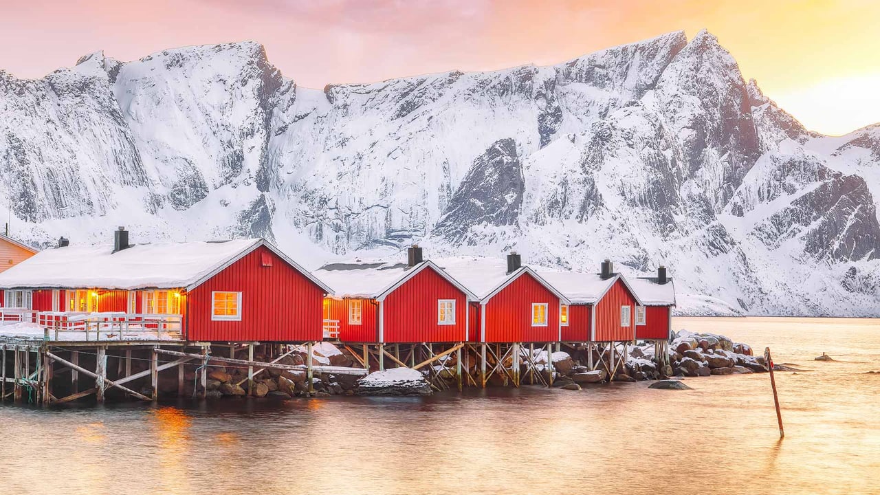 Traditional red fishermen's cabins on the shore of Reinefjorden, Norway (© Pilat666/Getty Images)