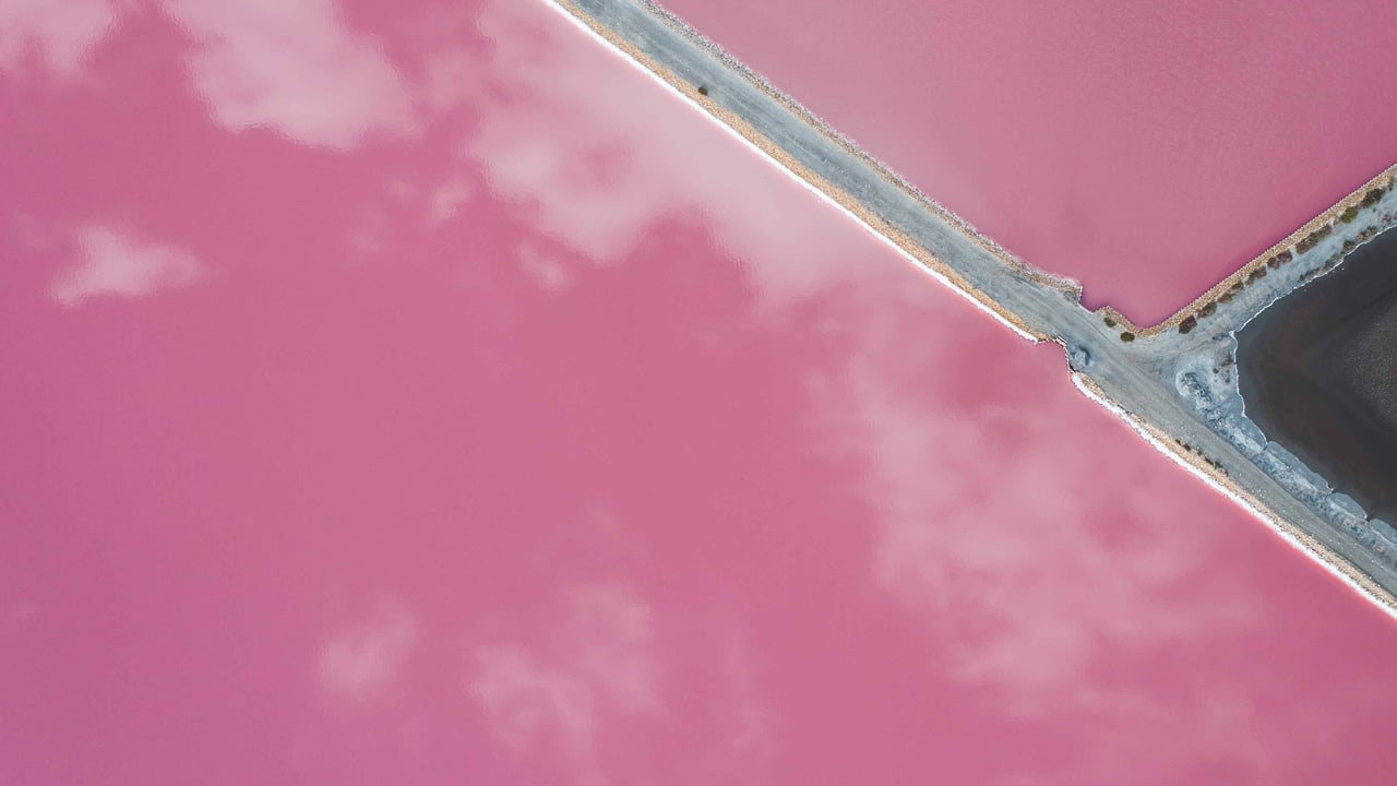 Pink salt lake, Gruissan, France (© Abstract Aerial Art/Getty Images)