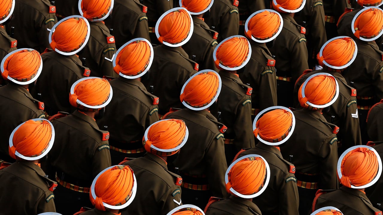 Indian army soldiers march during a dress rehearsal for the Republic Day parade (© Adnan Abidi/Reuters)