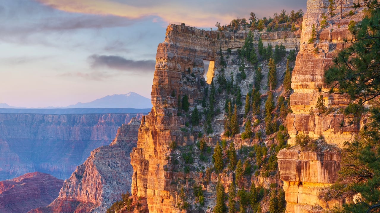 Peekaboo view of Angels Window on the North Rim of the Grand Canyon, Arizona (© Tim Fitzharris/Minden Pictures)
