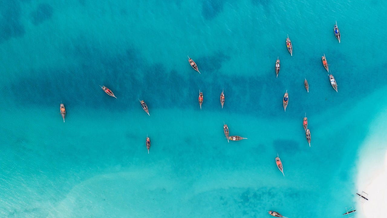 Wooden fishing boats at Kendwa, Zanzibar, Tanzania (© Lubos Paukeje/Alamy)