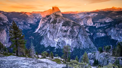 Bing wallpaper February 20, 2025. Alpenglow on Half Dome, Yosemite National Park, California (© Matthew Kuhns/TANDEM Stills + Motion)