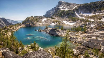 Bing wallpaper September 3, 2024. Crystal Lake in the Enchantments, Alpine Lakes Wilderness, Washington (© Mitch Pittman/Tandem Stills + Motion)