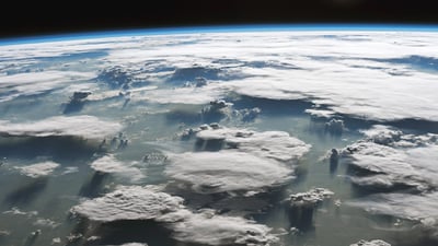 Bing wallpaper March 23, 2024. Large anvil clouds above the Amazon in Brazil (© NASA)