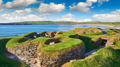 Bing wallpaper July 16, 2024. The Neolithic settlement of Skara Brae, Orkney, Scotland (© Paul Williams - FunkyStock/Getty Images)