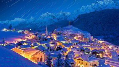 Bing wallpaper January 2, 2025. Star trails over Ardez, Graubunden, Switzerland (© Roberto Moiola/Getty Images)
