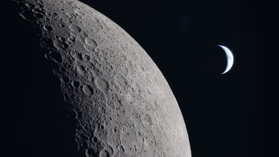 Bing wallpaper July 20, 2026. Moon and Earth captured by the Artemis II crew (© NASA)