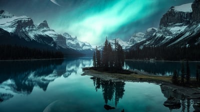 Bing wallpaper March 16, 2026. Aurora over Spirit Island on Maligne Lake, Jasper National Park, Alberta (© Mumemories/istock/Getty Images)