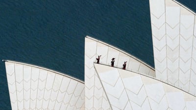 Bing wallpaper March 10, 2019. Royal Highland Fusiliers playing the bagpipes on top of the Sydney Opera House (© James D Morgan/Shutterstock)