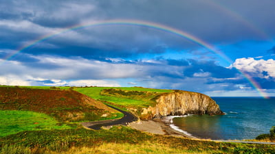 Bing wallpaper March 17, 2023. Ballyvooney Cove, Copper Coast Geopark, County Waterford, Ireland (© Andrea Pistolesi/Getty Images)