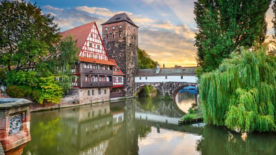 Bing wallpaper July 25, 2019. Weinstadel und Wasserturm am Ufer der Pegnitz, Nürnberg, Bayern, Deutschland (© SeanPavonePhoto/Getty Images)