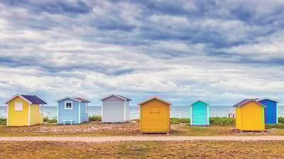 Bing wallpaper July 28, 2024. Bathing huts on the beach in Skåne County, Sweden (© Martin Wahlborg/Getty Images)