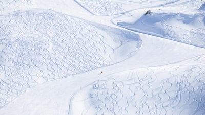 Bing wallpaper January 8, 2024. Skier at Bernina Pass, Graubünden, Switzerland (© Francesco Bergamaschi/Getty Images)