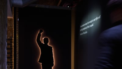 Bing wallpaper September 30, 2025. Silhouette of former South African President Nelson Mandela, 26 Leake Street, London, 2019 (© Leon Neal/Getty Images)