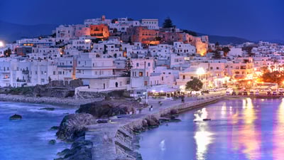 Bing wallpaper April 9, 2025. Blue hour in Naxos, Cyclades, Greece (© Sizun Eye/Getty Images)