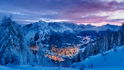 Bing wallpaper December 19, 2025. Snow-covered landscape at Bormio, Lombardy, Italy (© Roberto Moiola/Getty Images)