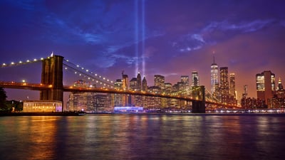 Bing wallpaper September 11, 2023. Brooklyn Bridge with the 'Tribute in Light' installation for 9/11, New York (© ANDREY DENISYUK/Getty Images)