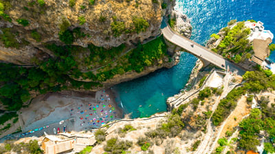 Bing wallpaper August 31, 2026. Vista aerea del Fiordo di Furore, Costiera Amalfitana, Italia (© Artur Debat/Getty Images)