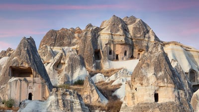 Bing wallpaper July 13, 2024. Fairy chimneys and cave dwellings in Cappadocia, Türkiye (© Storm Is Me/Shutterstock)
