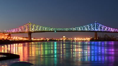 Bing wallpaper April 27, 2020. The Jacques Cartier bridge in Montreal is illuminated in the colours of the rainbow as a sign of hope and in support of the victims of the coronavirus (© ERIC THOMAS/AFP via Getty Images)