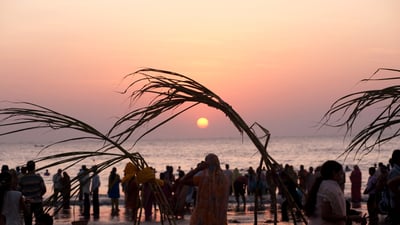 Bing wallpaper October 26, 2025. People worshipping the sun on Chhath, at Juhu Beach, Mumbai, Maharashtra (© Dinodia Photo/Getty Images)