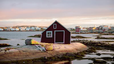 Bing wallpaper April 16, 2022. Small red house on the rocky coast of St. John's, Newfoundland and Labrador (© Jessie Brinkman Evans/Offset)