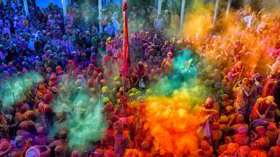 Bing wallpaper March 25, 2024. Celebrating Holi in Mathura, Uttar Pradesh, India (© Avishek Das/SOPA Images/LightRocket via Getty Images)