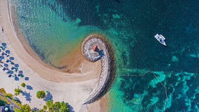 Bing wallpaper March 4, 2021. Nusa Dua coast with breakwater, Bali, Indonesia (© Dkart/Getty Images)
