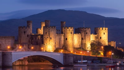 Bing wallpaper March 1, 2020. Conwy Castle illuminated at night, Conwy (© Jon Arnold/DanitaDelimont.com)