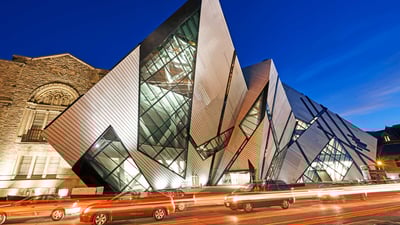 Bing wallpaper March 19, 2022. Façade of the 'Crystal' extension of the Royal Ontario Museum illuminated at night, Toronto (© Allan Baxter/Getty Images)